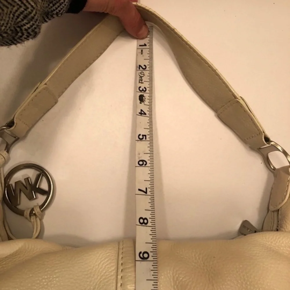 Michael kors cream pebbled leather hobo bag